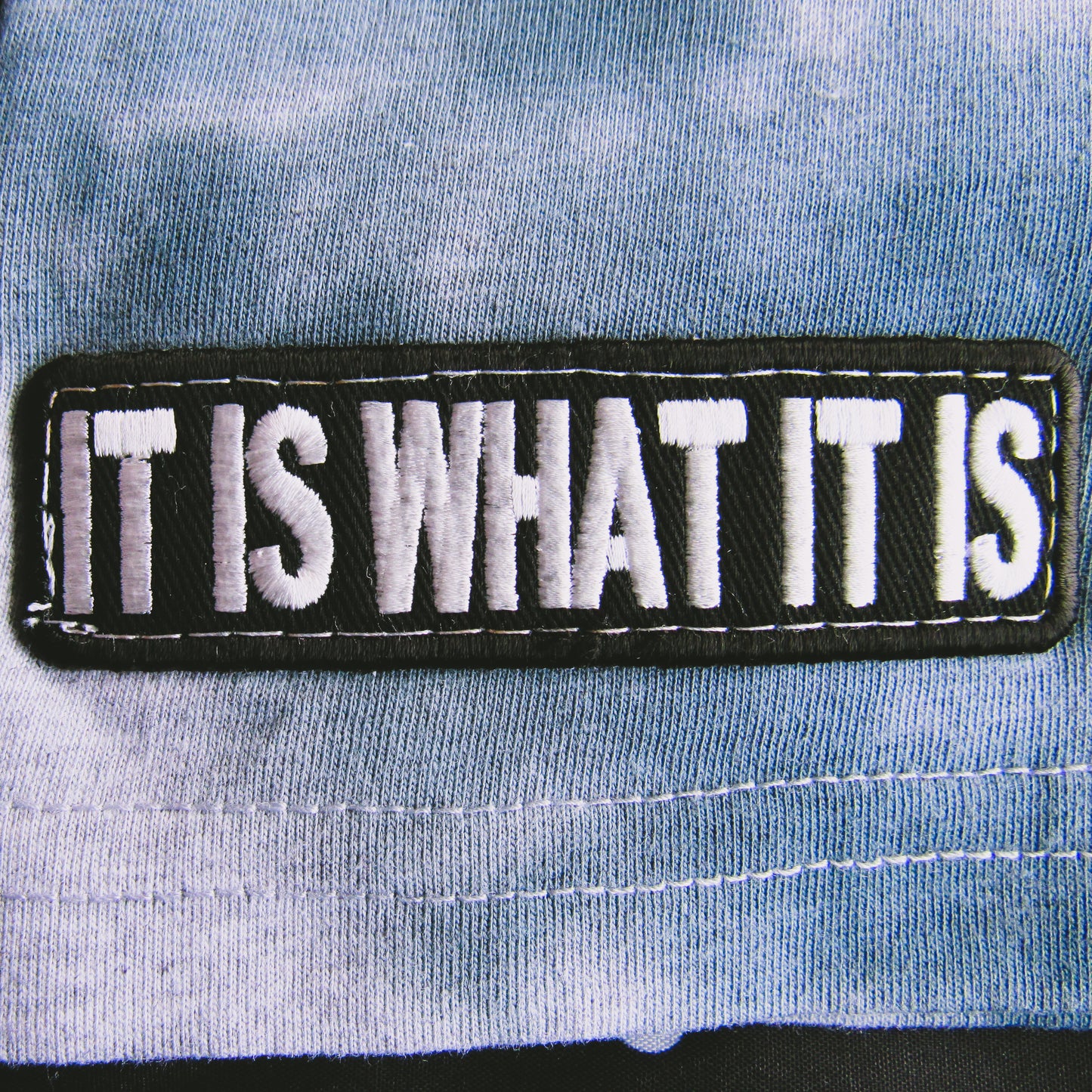 Dark Grey Spiral Tie Dye On A Grey T Shirt