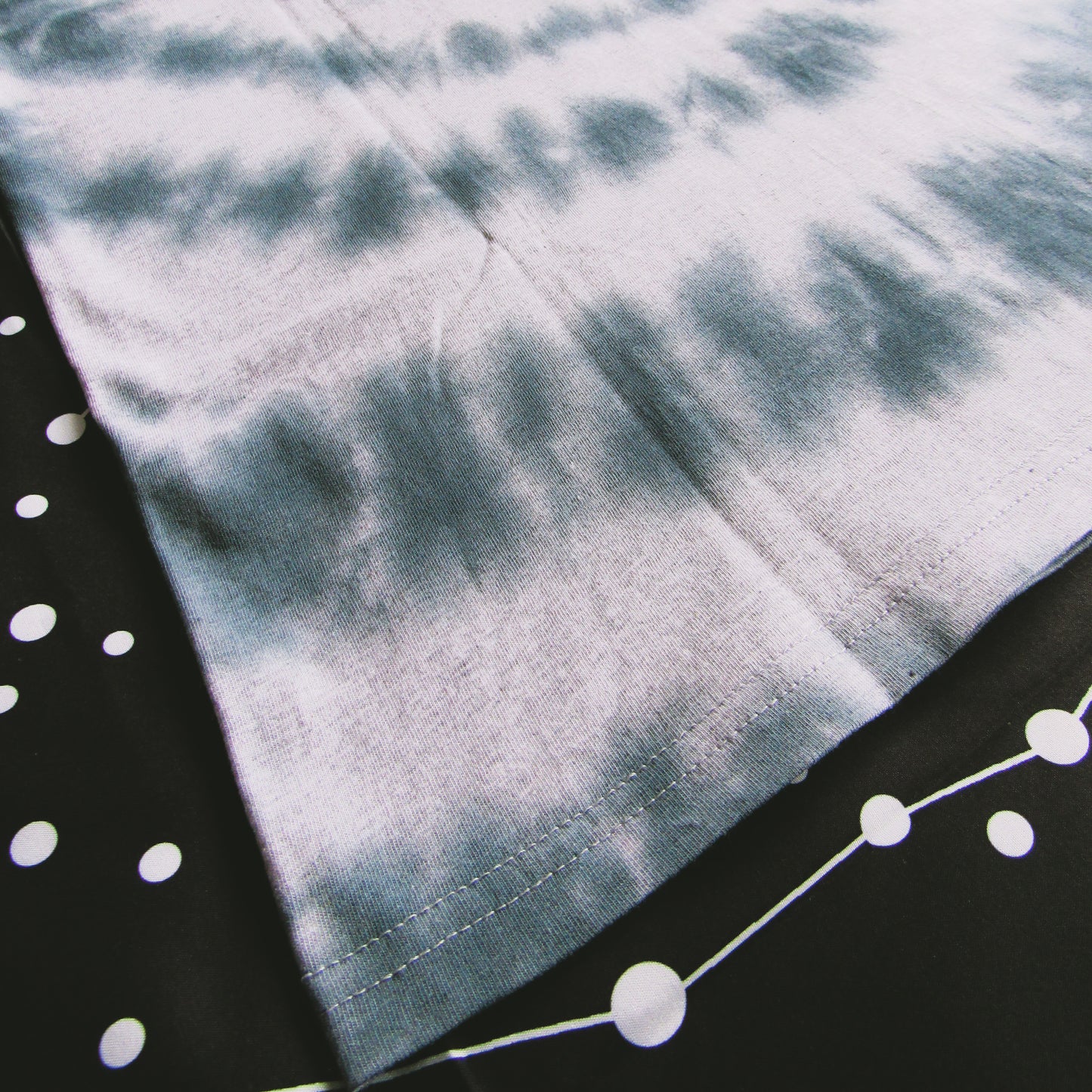 Dark Grey Spiral Tie Dye On A Grey T Shirt